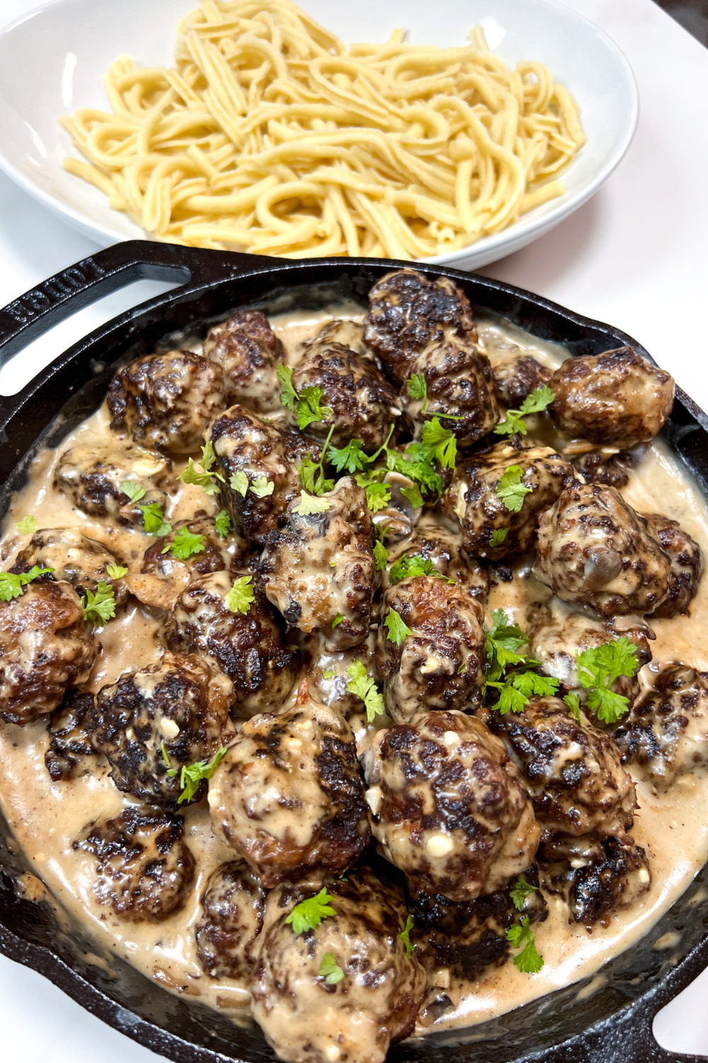 Meatballs in Mushroom Gravy with parsley on top